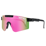 Óculos de sol Extreme modelo ciclismo em ângulo lateral na cor preto com rosa, disponível em: ethosloja.com.br