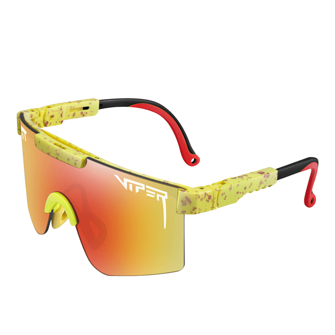 Óculos de sol Urban modelo ciclismo em ângulo lateral na cor amarelo com laranja, disponível em: ethosloja.com.br